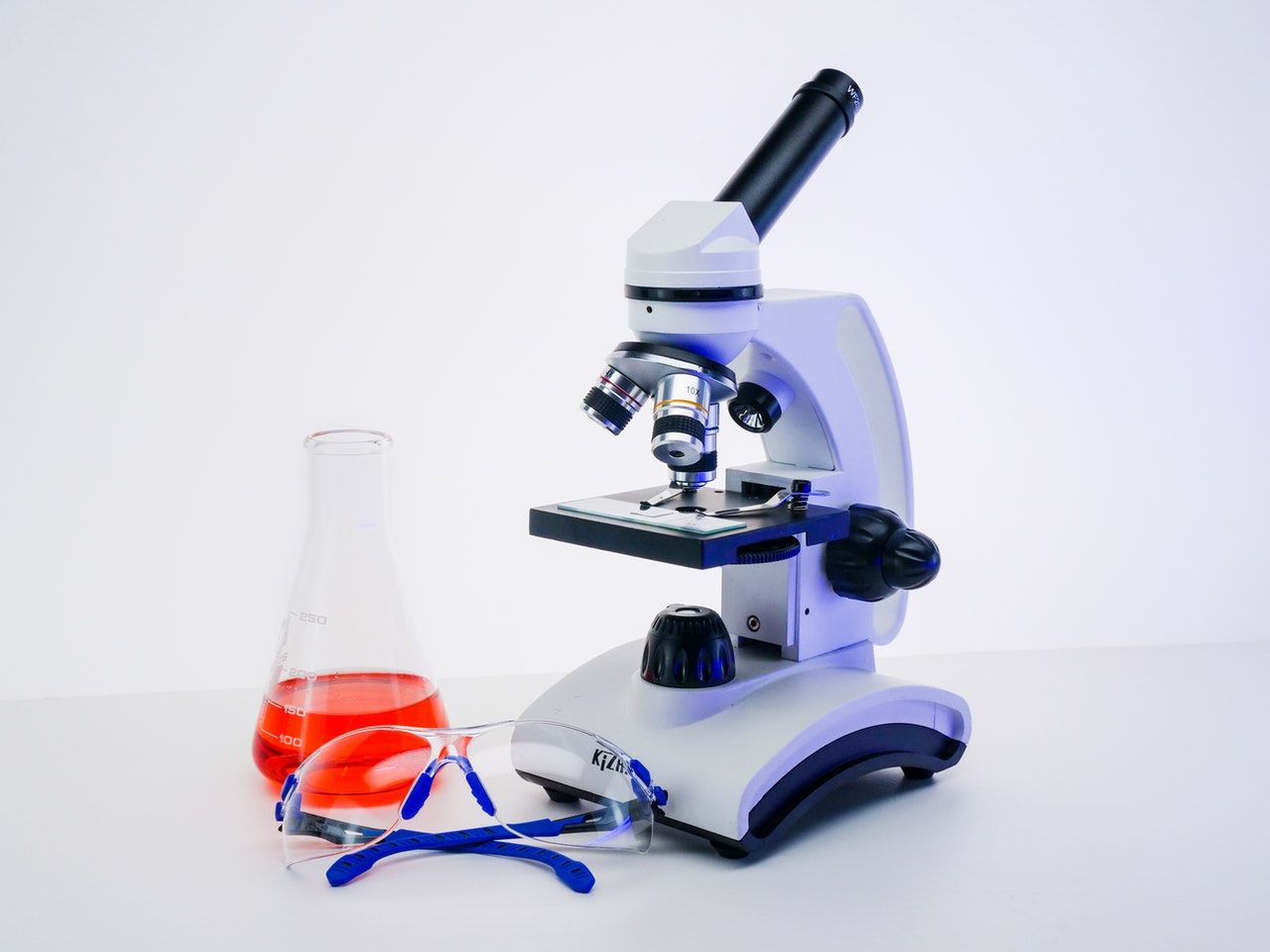 traditional-microscope-on-white-background.jpg